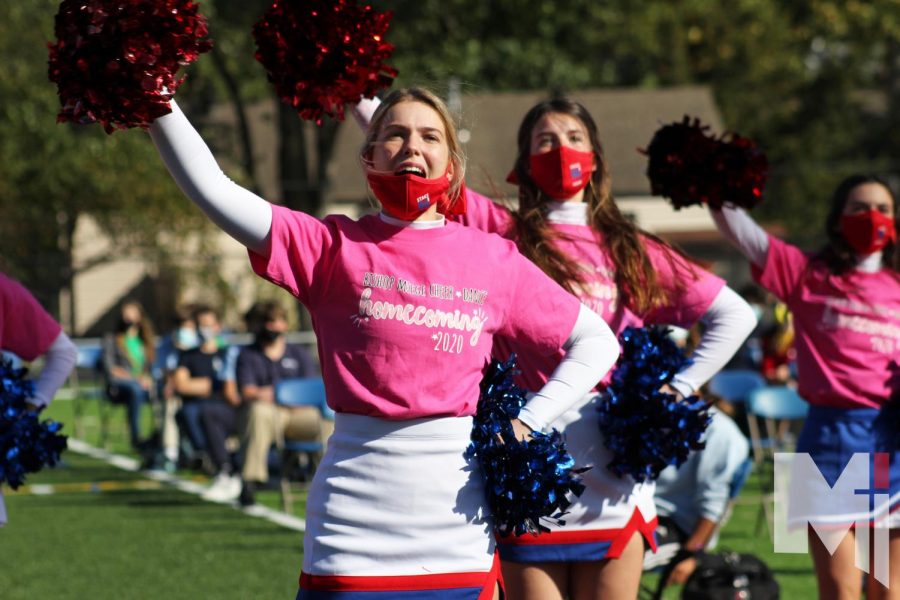 The cheer squad leads the school in showing some spirit. The cheerleaders wore pink shirts to commemorate breast cancer month and the Homecoming weekend.
