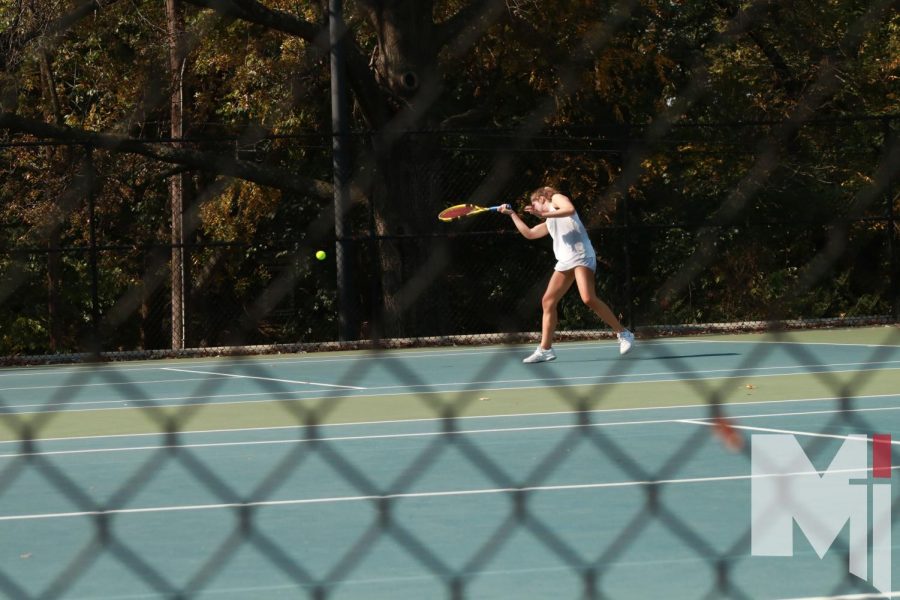 Sophomore Lauren Myers competes in singles at Regionals.