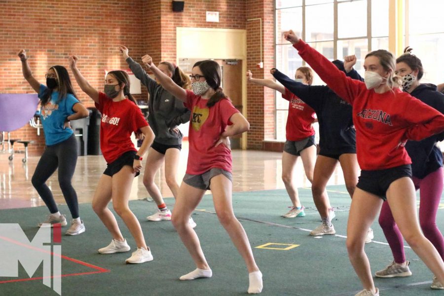 The varsity dance team practices a new hip-hop routine choreographed by assistant coach Natalie Hogue at North Campus for an upcoming virtual 4A competition. 