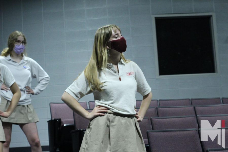 Junior Francesca Dessert poses while dancing to "Crazy Little Thing Called Love" by Queen. This is one of the three dances prepared for the Concert Chorale's spring performance.