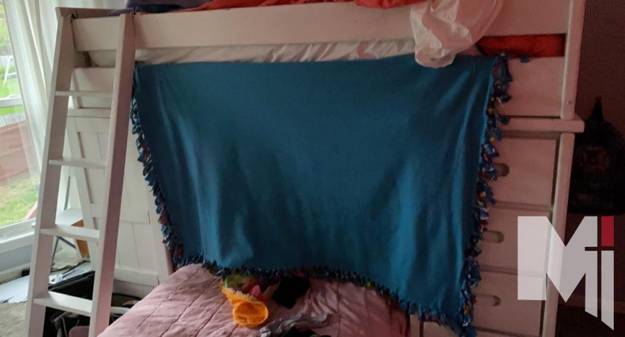 Sophomore Maggie Nobblit creates a space for herself by putting up blankets and pillows. According to Nobblit, small and dark spaces make her feel at ease during panic attacks.