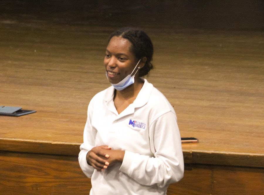 Senior Emajin McCallop introduces the Cultural Diversity Club with slides at the first meeting.