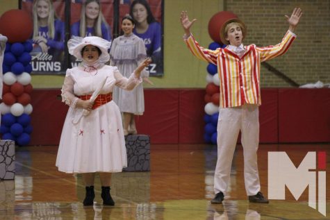 The opening bars of Jolly Holly, from Bishop Mieges fall musical Mary Poppins, play as senior Cara Parisi and sophomore Peter Dessert take the floor. 