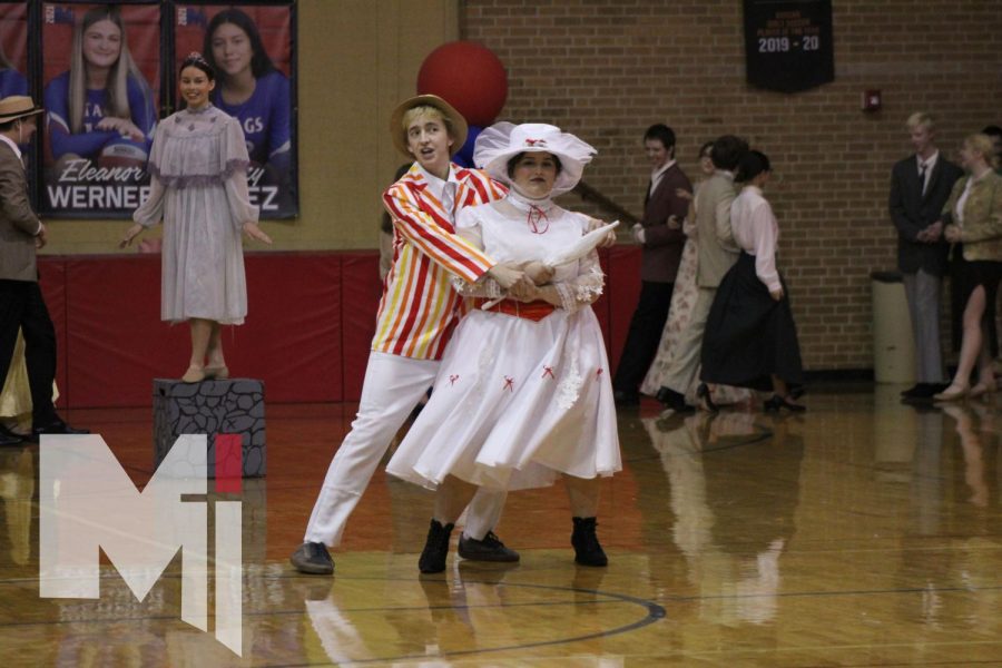 Musical leads, senior Cara Parisi and sophomore Peter Dessert showcase Jolly Holiday to the student body on Thursday afternoon. 