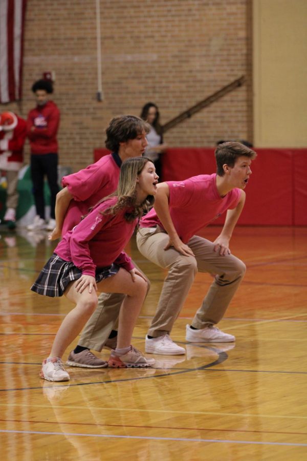 Victors of the holiday lip-sync battle,  Reardon herd members dance to one of their songs. Senior Paul Ruf choreographed the number and performed with his sister sophomore Megan Ruf and freshman Oliver Busenhart.