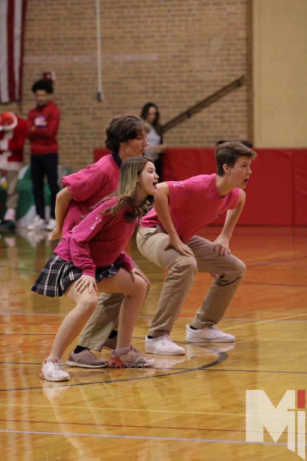 Victors of the holiday lip-sync battle,  Reardon herd members dance to one of their songs. Senior Paul Ruf choreographed the number and performed with his sister sophomore Megan Ruf and freshman Oliver Busenhart.