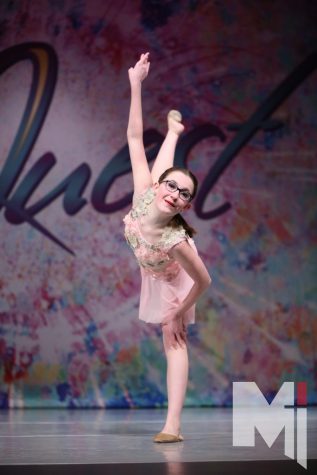 Striking a pose, competitive dancer Sophia Gasset dances to her solo Warrior.