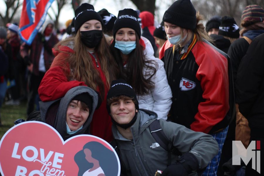 Posing for a picture, senior Zoran Rodriguez, junior Jack Elder and freshmen Aryanna Rodriguez, Rose Lopez and Sammy Jo Kirk wait for the March to begin. A rally took place before the March, which included a concert and several speakers.