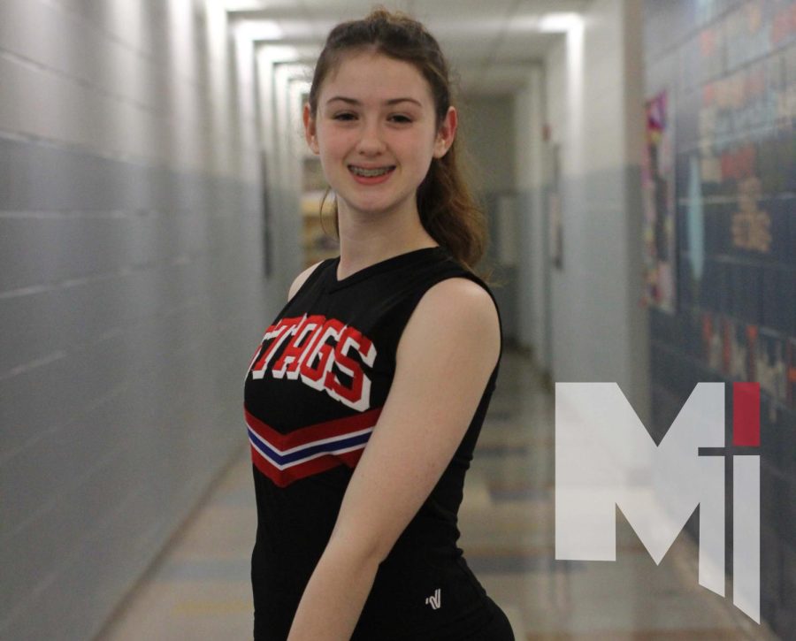 During the boys basketball sub-state game, freshman Lucy Liston prepares to dance at halftime.  