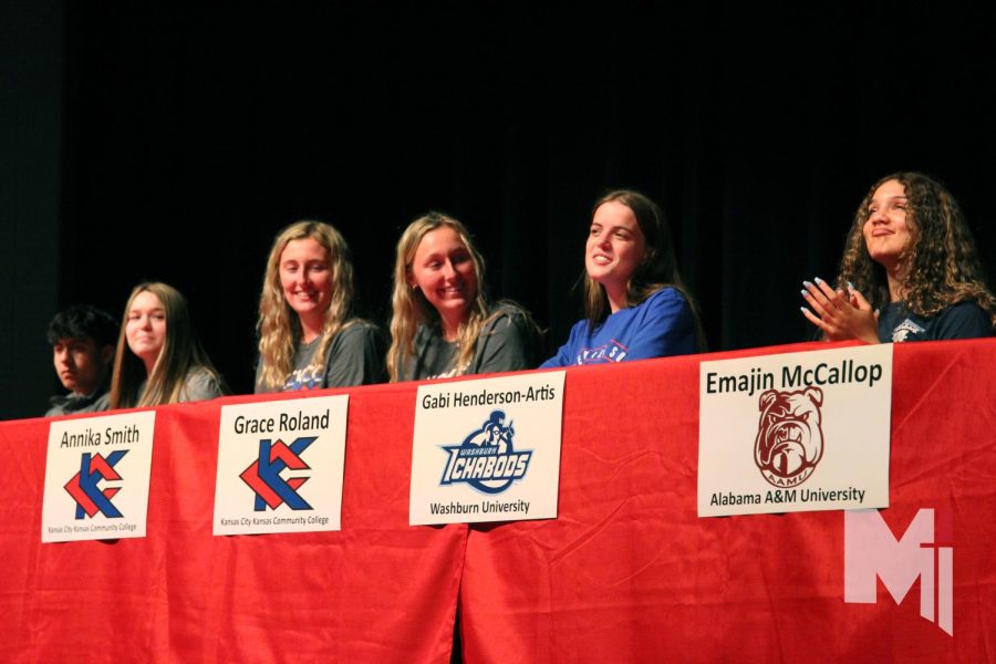Signing Off: Student-Athletes remain together through college