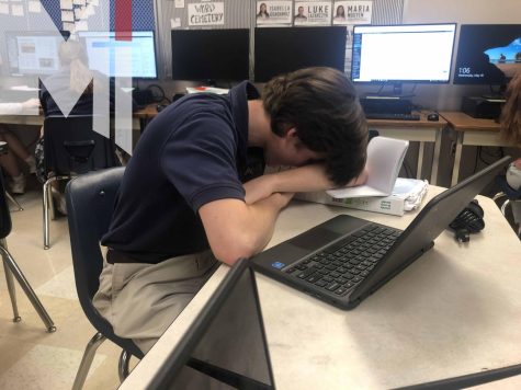 Junior Luke Crawford catches up on rest during class.