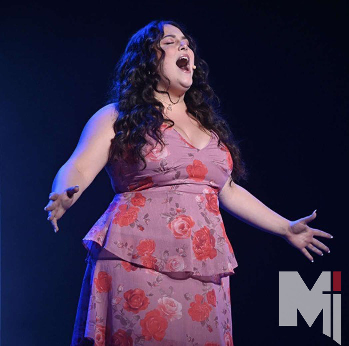 Alumna Cara Parisi sings at the Jewish Community Center for the finals of the KC SuperStar competition, where she won $10,000. 