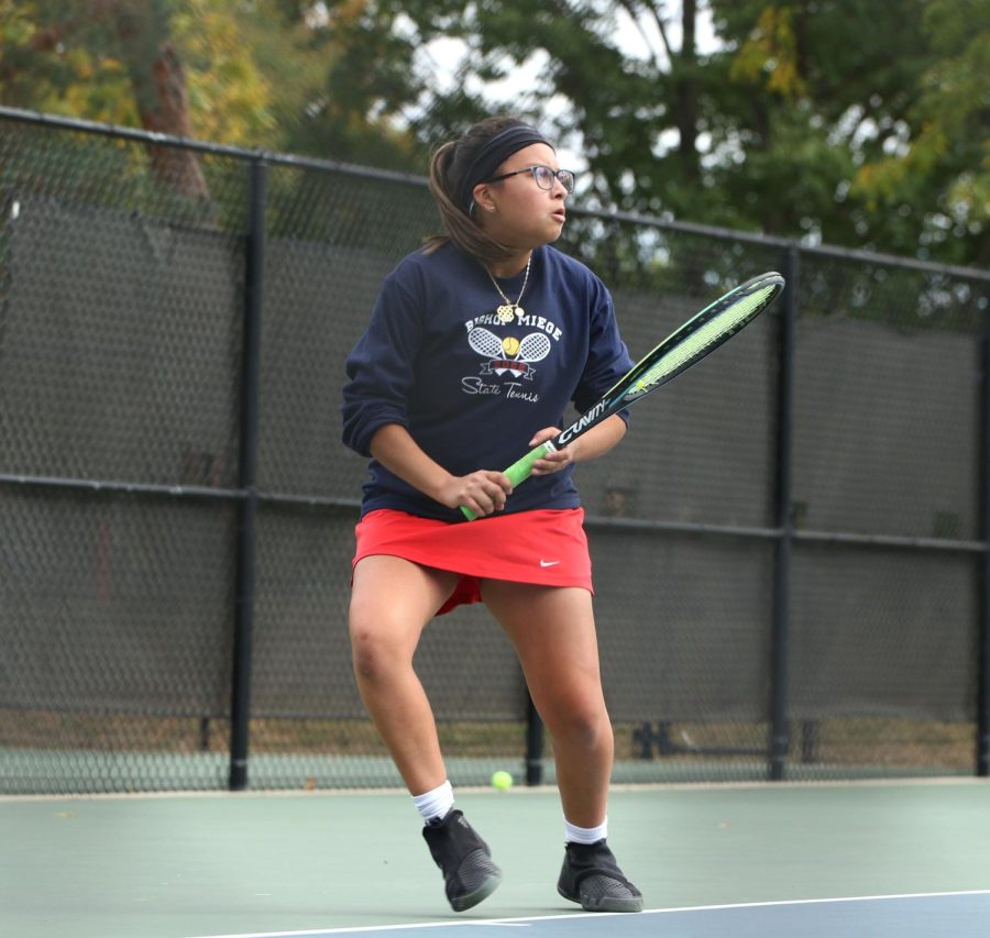 With her game face on, senior Dania Loredo competes in the singles tournament at tennis state. This was the first time Loredo competed at the state tournament. 