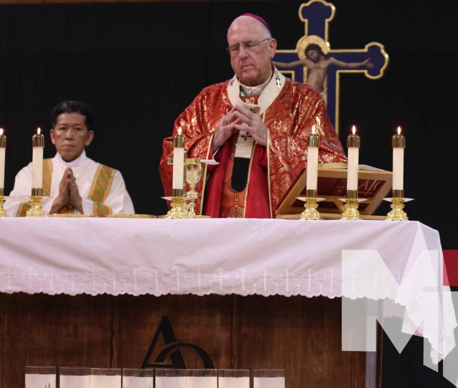 +Archbishop+Joseph+Naumann++++celebrates+the+Eucharist+on+altar+created+by+Father+Anthony+Mersmann.%0A