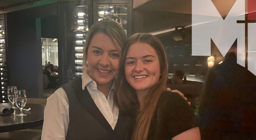 Sophomore Grace Valdivia poses with her aunt who works at Ocean Prime on the Plaza.
