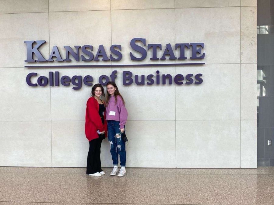 Standing together, seniors Chloe Pennington and Allison Brentano visit Kansas State University in April. Brentano toured four colleges before deciding to attend Kansas State University.