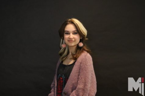 Starting off her music teaching career, senior Polly Ayala began teaching violin lessons to children of St. Agnes Grade School over the summer. It feels good to actually teach a younger generation how you started out to play an instrument, Ayala said. 