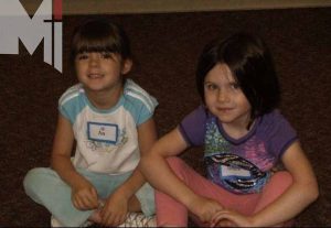 Senior Ava Fortin (left) and Grace Grams (right) on their first day of kindergarten.