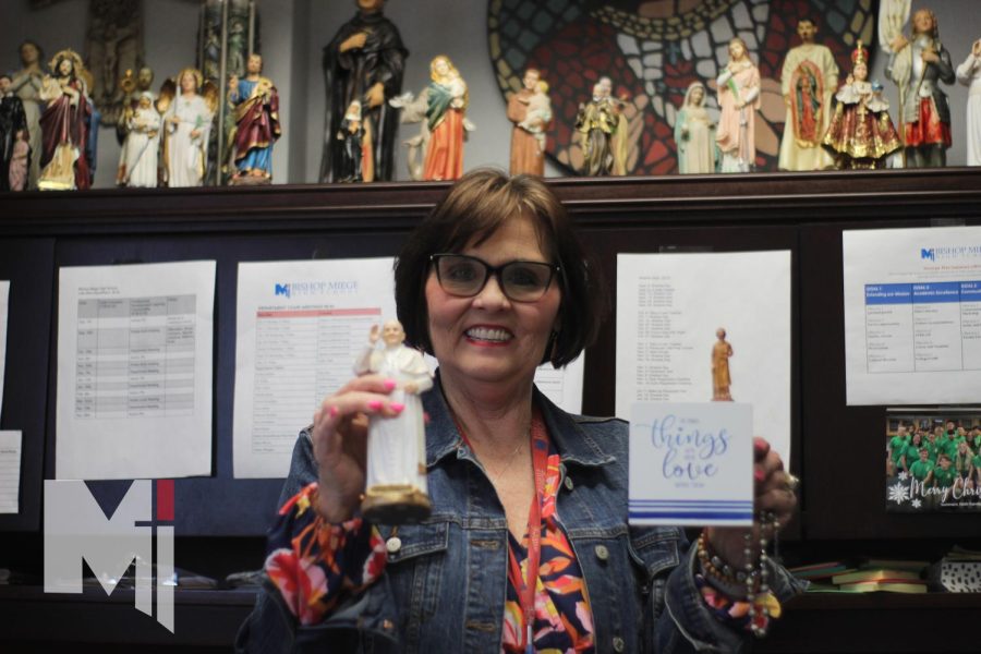 As a symbol of her faith, principal Maureen Engen collects and distributes spiritual items.