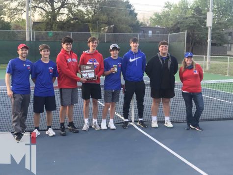 Head tennis coach Andrew Groene and his team celebrate a runner-up finish at KSHSAA 4A regionals on May 6. 