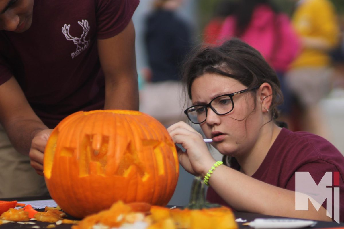 At the herd pumpkin carving. freshman Evelyn Howard carved the pumpkin for the bohaty herd