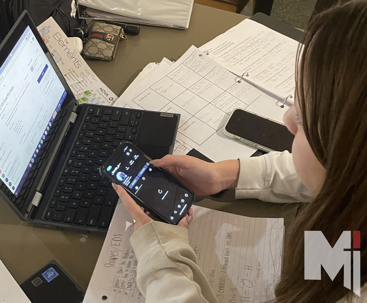 Sophomore Kierstin Moore turns off her phone notifications before beginning her homework to avoid distractions. 