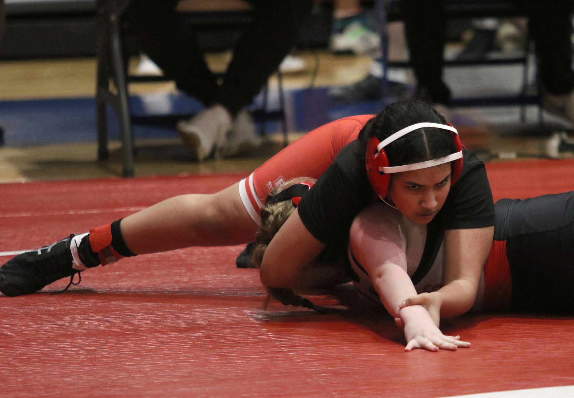 Girls Wrestling on the Rise: Team Doubling in Size, Impressive Performances, and Growing Popularity