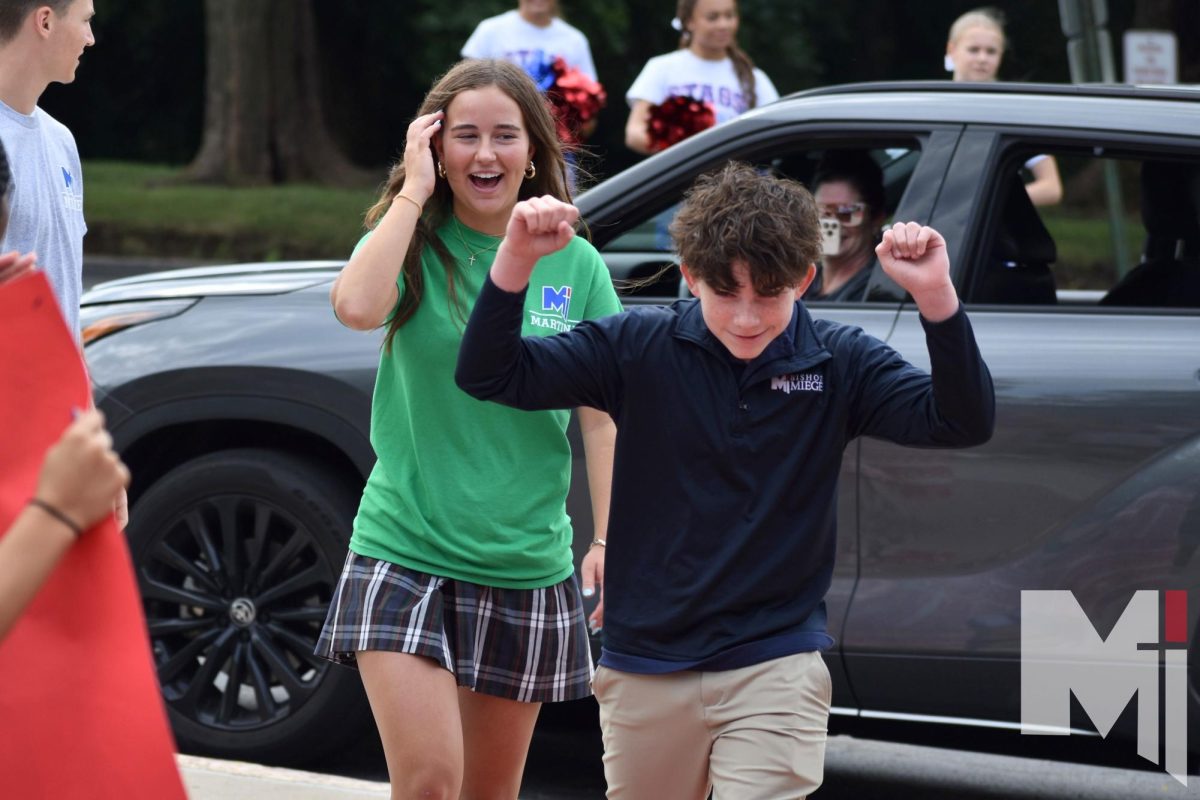 Filled with excitement, freshman Knox Frizzell pumps his fists as he is cheered on by the seniors at the Freshmen Welcome. “I had lots of overwhelming feelings walking into a new school with all the upperclassmen greeting me and hyping up all the freshmen,” Frizzell said. “It Was a great feeling to be welcomed into a new school and I really feel like I belong.” Frizzell said. “I even participated in a Herd Competition that day and even though I got out in the second round, it was super fun.”
