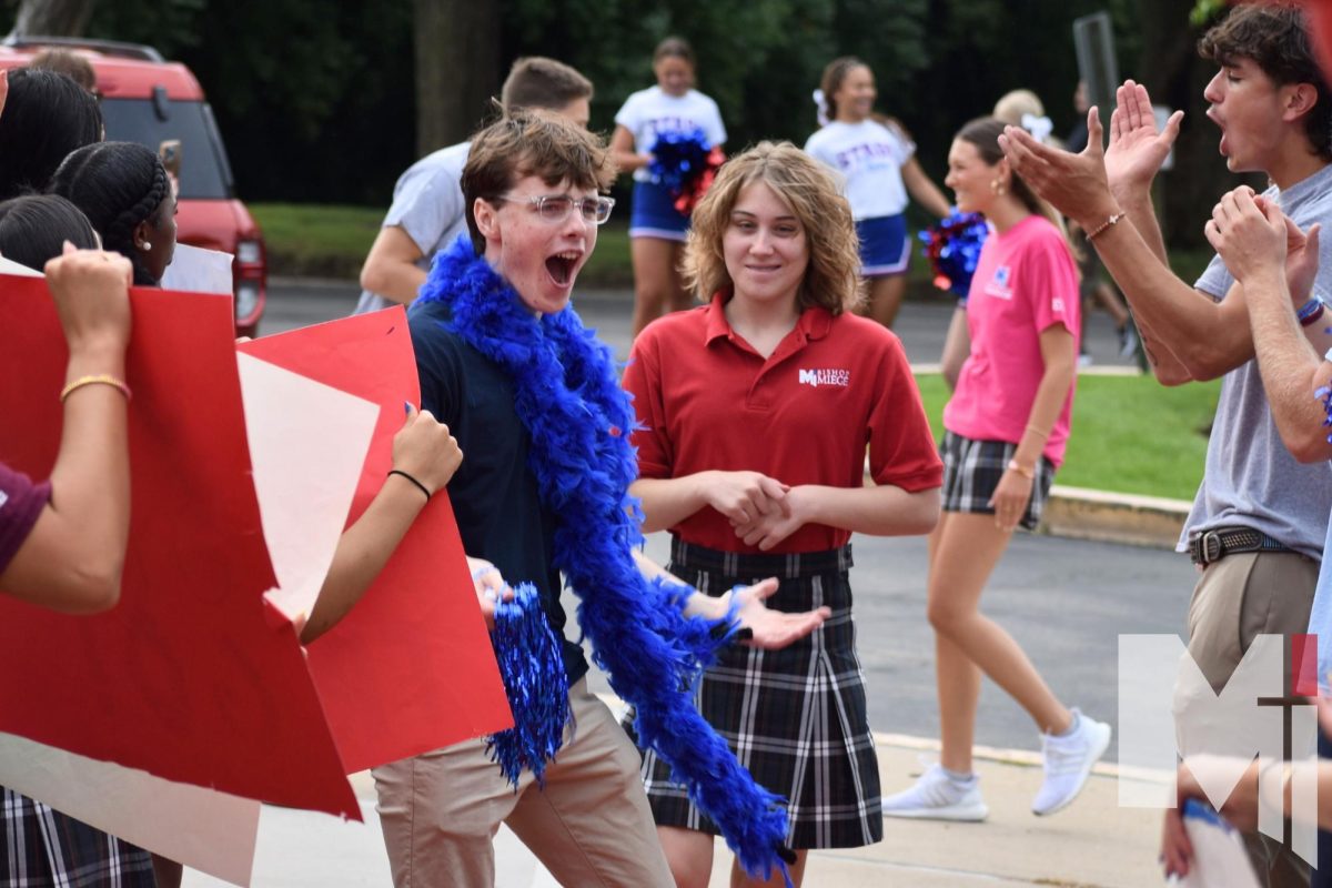 Pulling up in her parent’s car to the red carpet welcome, freshman Neva Goetz had no idea what she was walking into. “Some guy just opened my door for me, but walking down the red carpet made me feel like I really belonged because everyone was like, ‘Oh, it’s Neva,’” Goetz said.