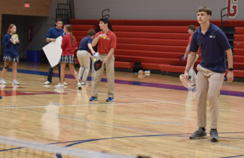 Sophomore Gabriel Brooks plays pickleball during Flex Time. "I think pickleball is really fun, and I heard about it through some of my friends," Brooks said. "Pickleball club is really fun because it's more of a physical club rather than an intellectual."