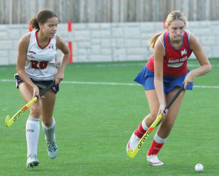 Senior Ellouise Sill plays at a field hockey game against Pembroke Hill. "Field hockey was great and I became really passionate about it, and our coaches are enthusiastic and encouraging which has made practices and games even more fun," Sill said. "I loved playing field hockey because I was able to be a part of such a remarkable team, and I made new memories with the new people I grew closer with." 