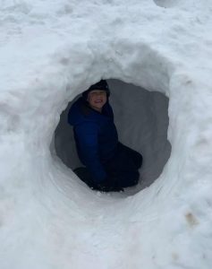 To pass time during the snow days, kids such as staffer Sophia Hart's brother play in the multiple inches of snowfall. The amount of snow has added to the conditions that first-responders face.