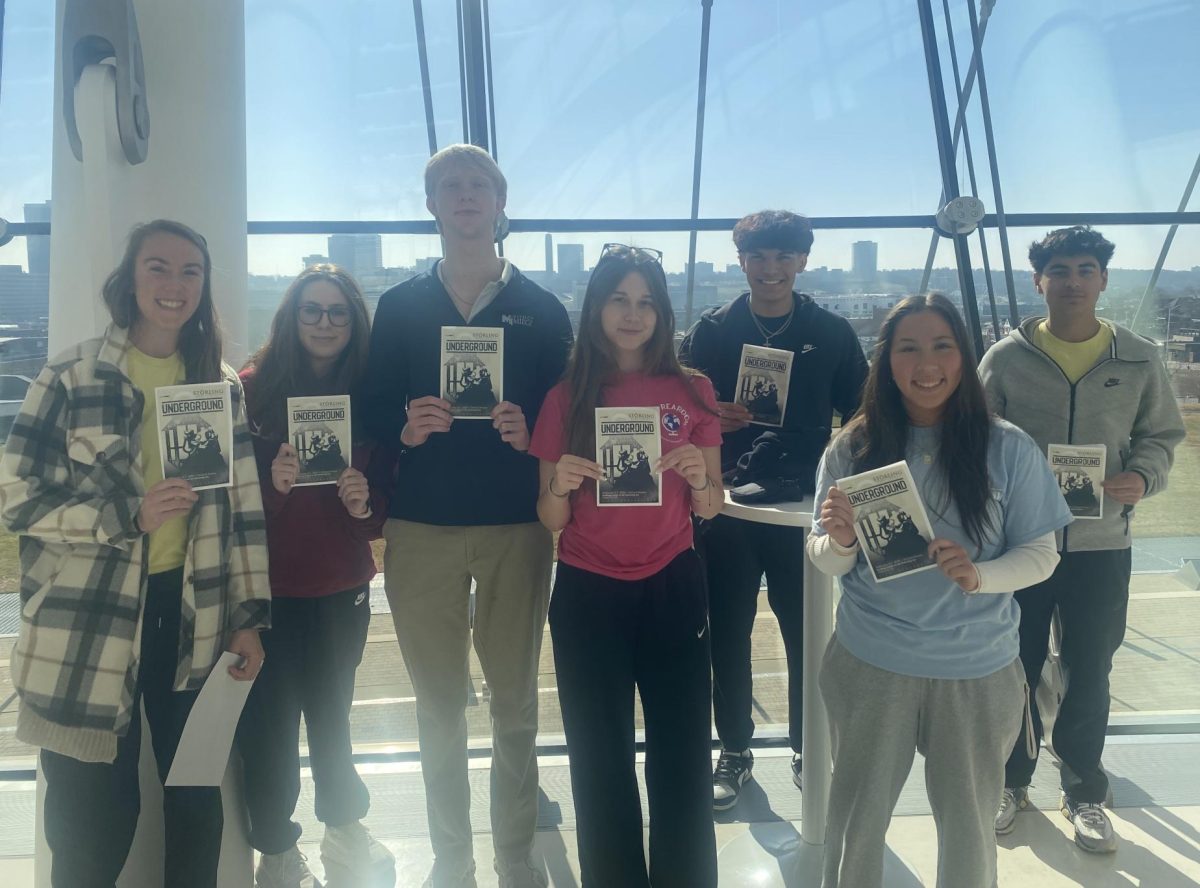 Social studies teacher Maggie Verscheldoen is pictured at the Kauffman Center for the Performing Arts with a range of the juniors and seniors in the class. 