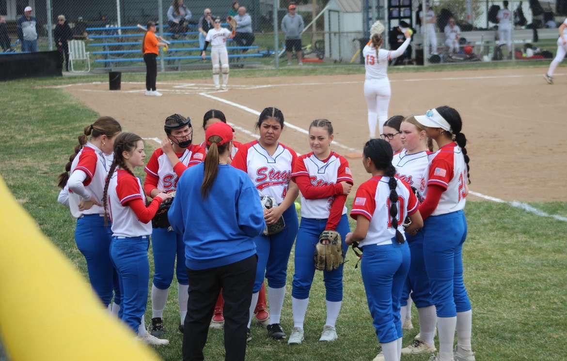 Head Coach Kelly Latendresse takes a timeout to advise and uplift the team during a game. The girls compete in 16 regular season games from schools all over the metro. 