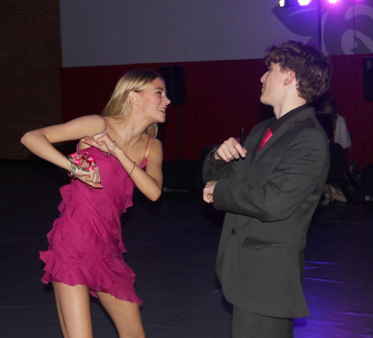 Dancing Fever. Sophomore Emorey Koehler busts a move with sophomore Cooper Woods at the Sadie Hawkins dance. “I was really happy that night,” Koehler said. “We were having so much fun on the dance floor.” 